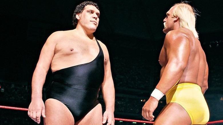 Hulk Hogan and Andre the Giant stare each other down in the ring at WrestleMania III.