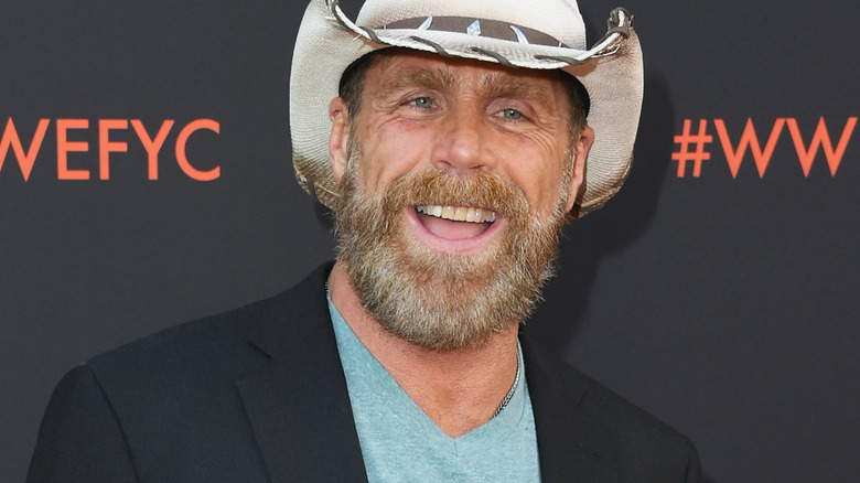 Shawn Michaels is wearing a white cowboy hat