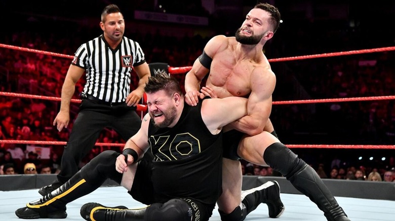 Kevin Owens and Finn Balor in the ring
