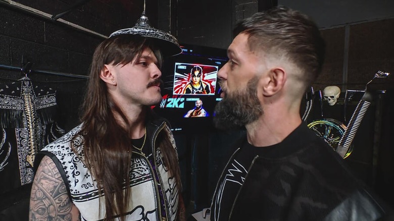Dominik Mysterio and Finn Balor backstage