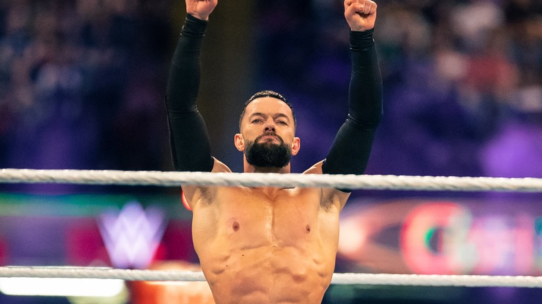 Finn Balor hands up