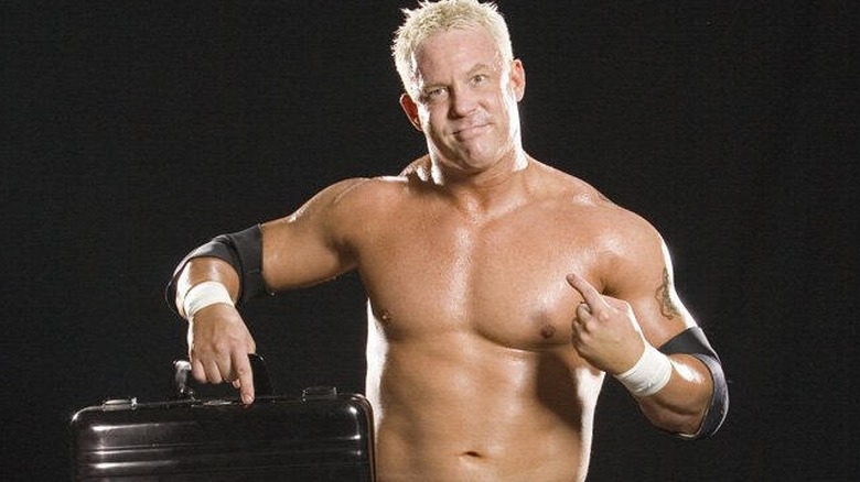 Mr. Kennedy posing with the Money in the Bank briefcase during a photoshoot after winning it in 2007