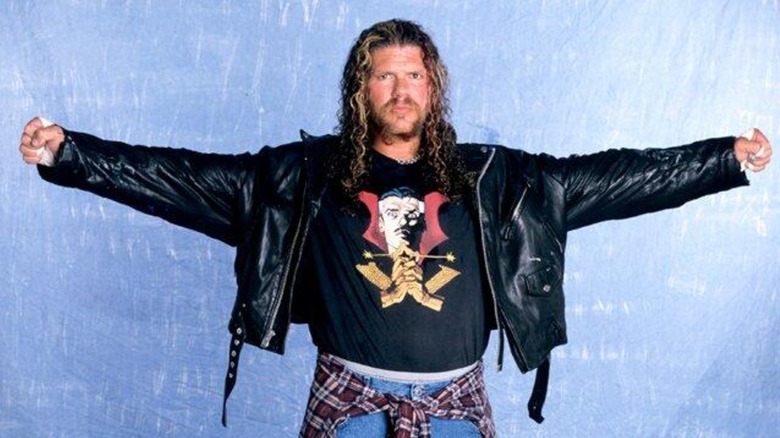 Raven posing in WWE