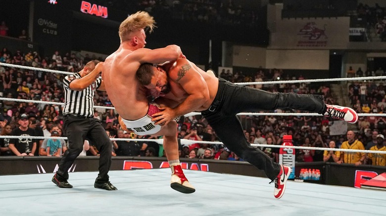 Bron Breakker hitting Ilja Dragunov with a Spear during an episode of 