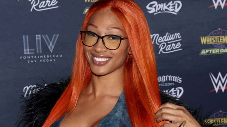 Mara Sade wearing glasses
