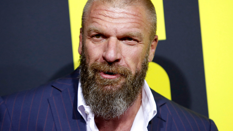 Triple H poses for photo