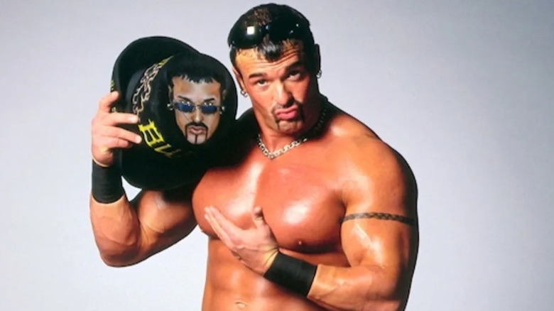 Buff Bagwell poses with his signature hat during a backstage photo shoot