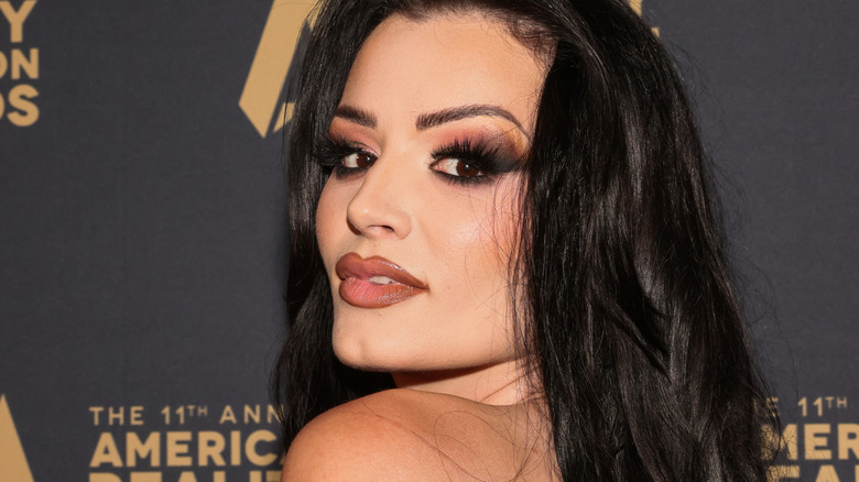 saraya posing on red carpet