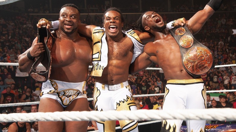 The New Day celebrating