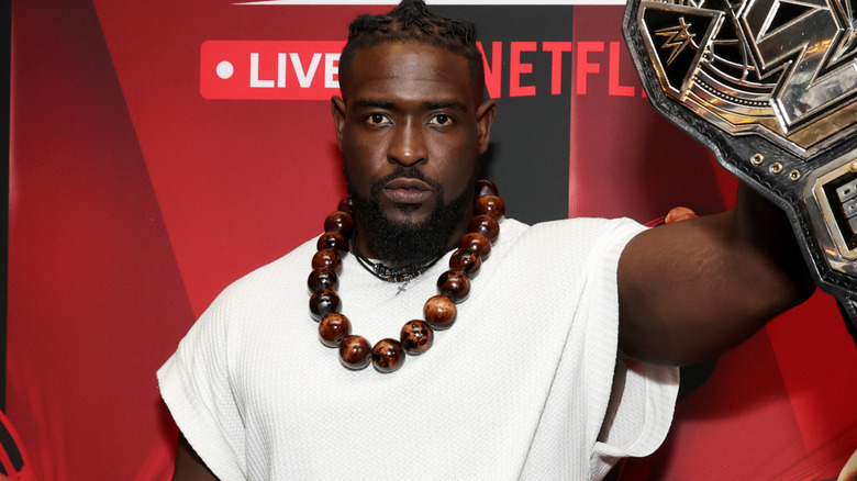 Oba Femi holding the NXT Championship