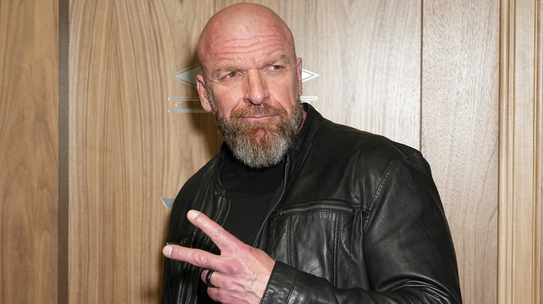 HHH posing at an event