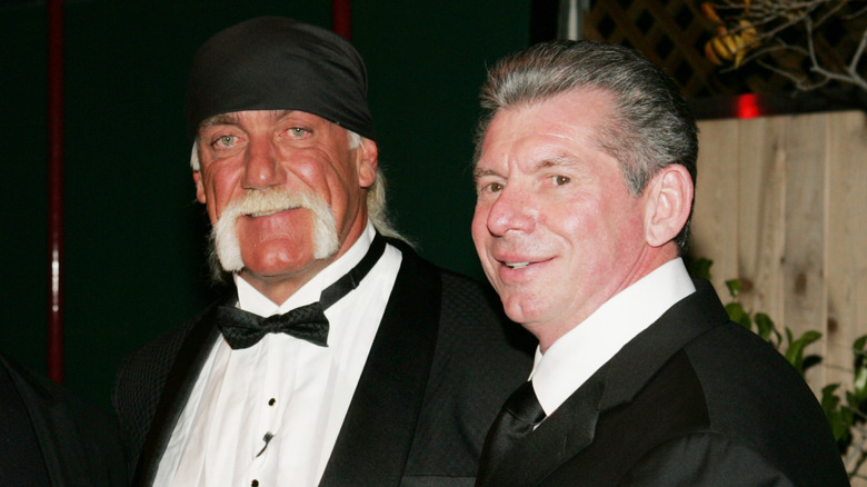 Hulk Hogan and Vince McMahon pose for a photo together