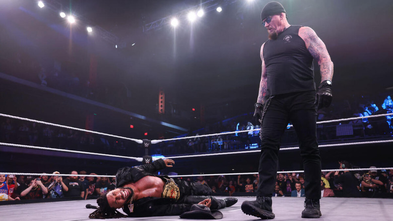Trick Williams and The Undertaker in the ring