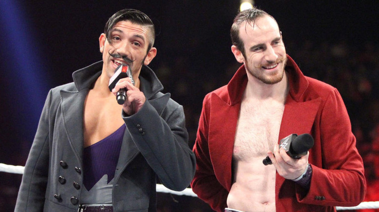 The Vaudevillains holding microphones