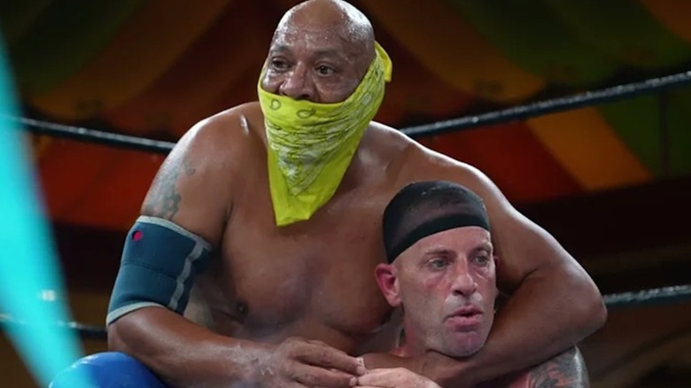 2 Cold Scorpio in a GCW ring with The Grim Reefer