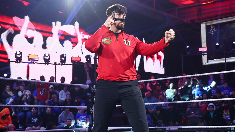 Andre Chase on WWE NXT wearing a protective facemask in the ring
