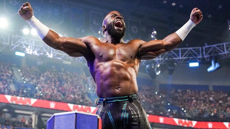 Former WWE star Apollo Crews poses on the ropes before a match on WWE programming.