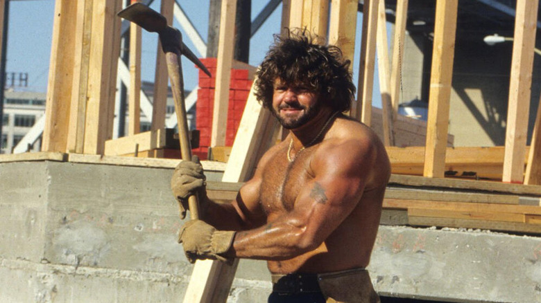 Billy Jack Haynes holding an axe