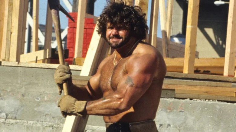 Billy Jack Haynes wearing gloves on his hands