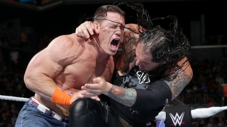 Baron Corbin and John Cena wrestling at WWE SummerSlam 2017