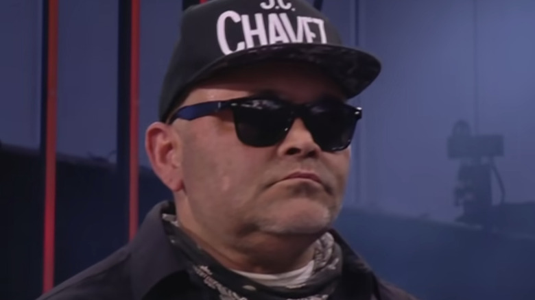 Konnan looks away