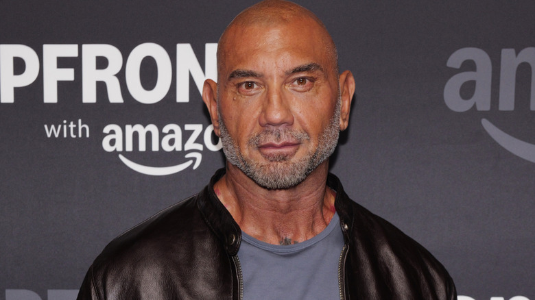Dave Bautista wearing a black leather jacket