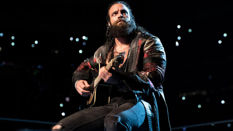 Former WWE Star Elias playing the guitar