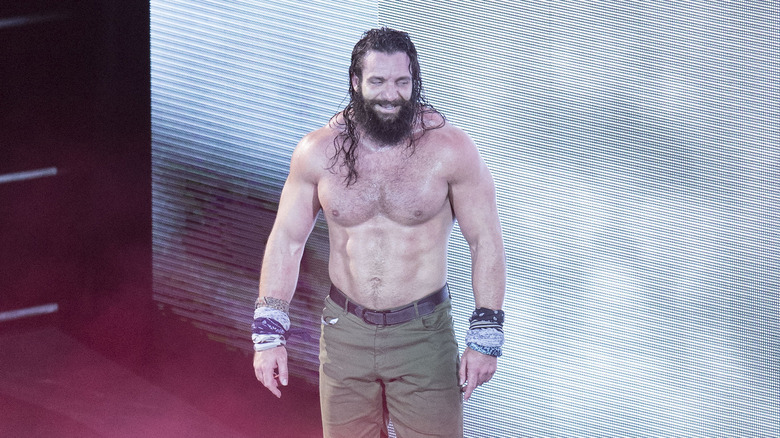 Elias smirks to himself