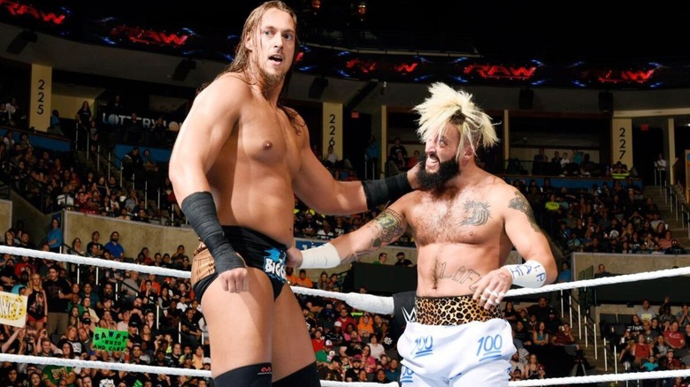 Big Cass and Enzo Amore celebrate in the ring after a tag team victory during an episode of "WWE Raw."