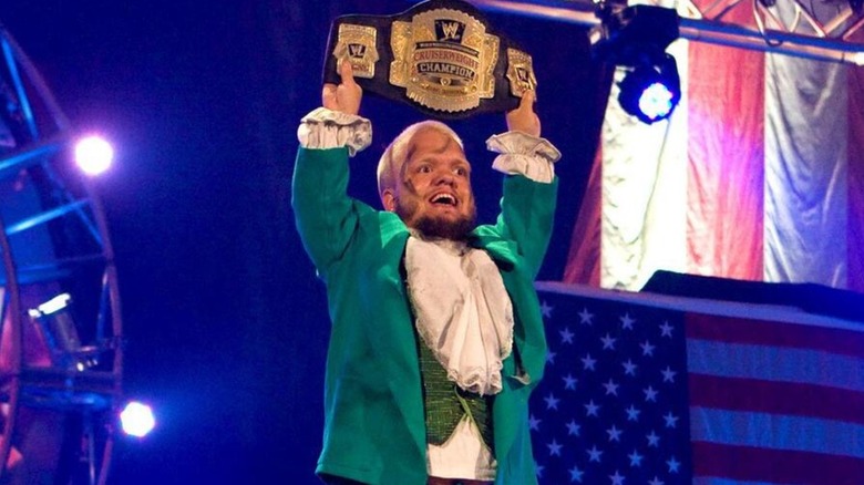 Hornswoggle posing with the WWE Cruiserweight Championship.
