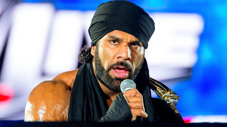 Jinder Mahal with a mic