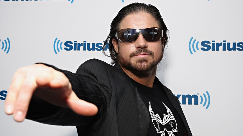 John Hennigan during a photoshoot at a SiriusXM event.