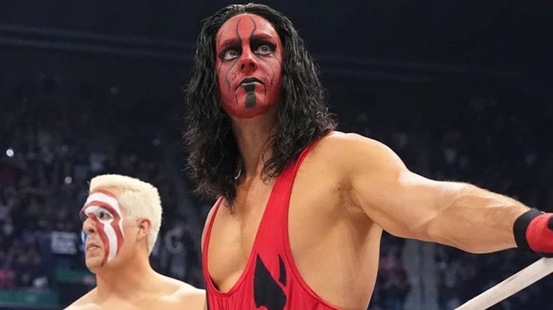 Steven Borden Jr. in ring alongside his brother, Garrett Borden, during AEW Revolution 2024 where both brothers dressed up as their father, Sting.