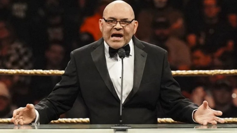 Konnan gives a speech in the center of the ring during the WWE Hall of Fame ceremony.