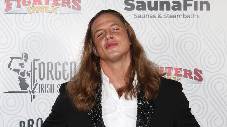 Matt Riddle poses on the red carpet