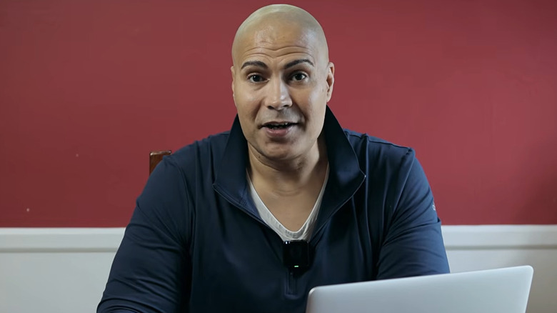 Maven sitting in front of a computer