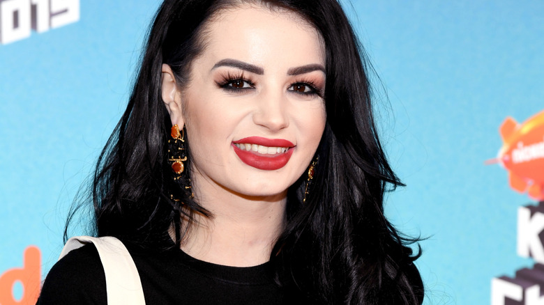 Paige posing on the red carpet