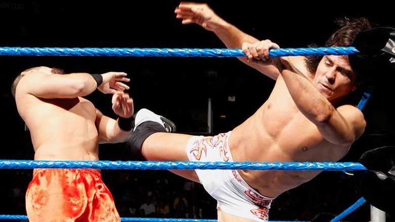 Paul London hitting a superkick during a match on 
