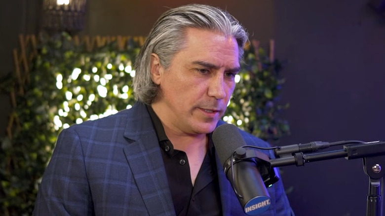 Paul London wearing a suit