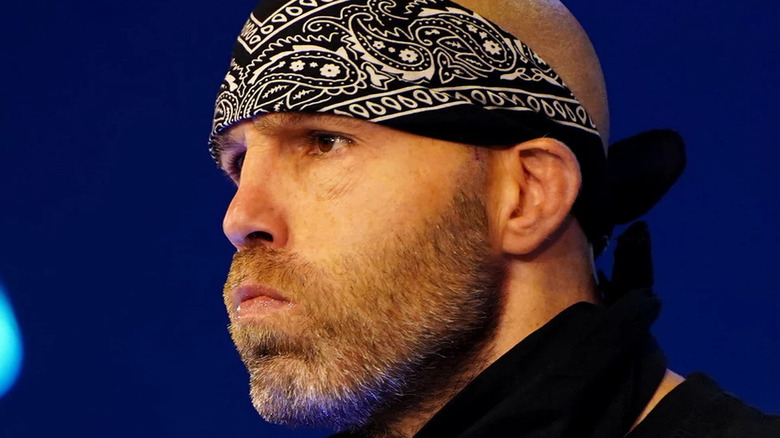 Nick Gage looks away