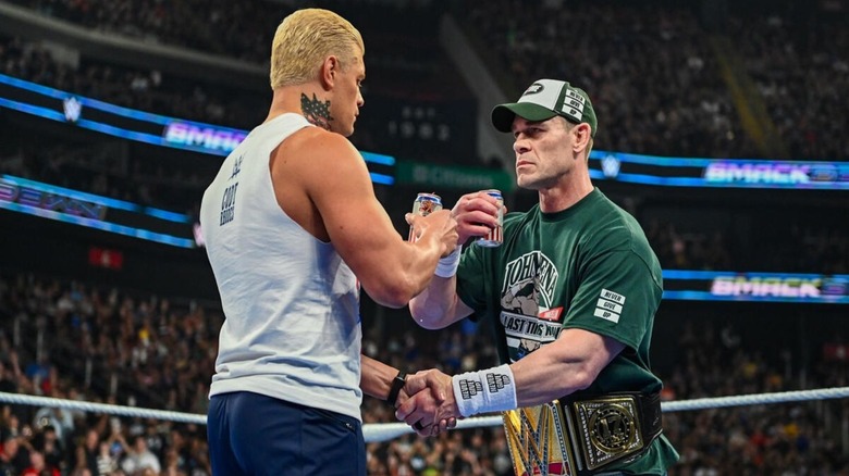 Cody Rhodes and then-Undisputed WWE Champion John Cena share a beer in the middle of the ring on the August 1, 2025 edition of 