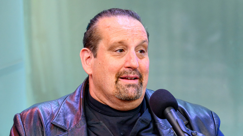 Tommy Dreamer sitting down during a Busted Open recording