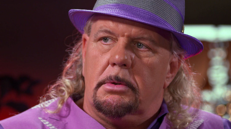 Michael Hayes with purple hat