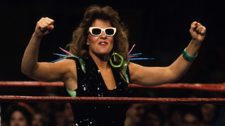 WWE Hall of Famer Wendi Richter smiles on ahead of one of her matches