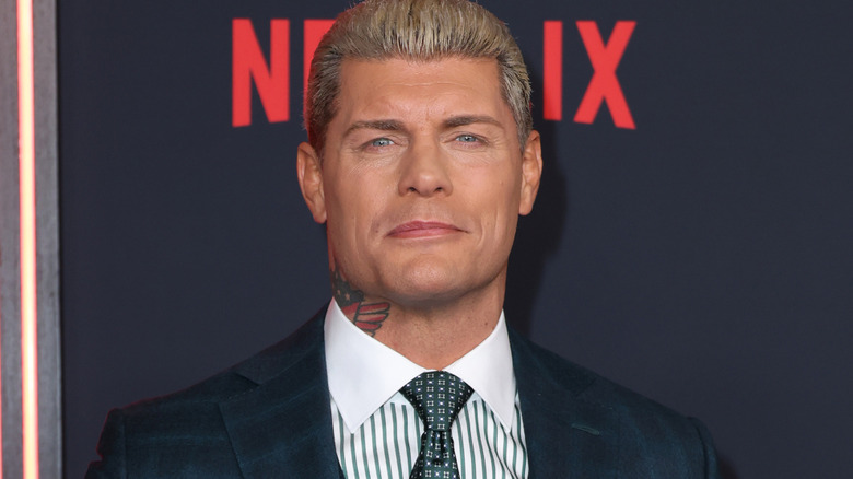 Cody Rhodes wearing a suit