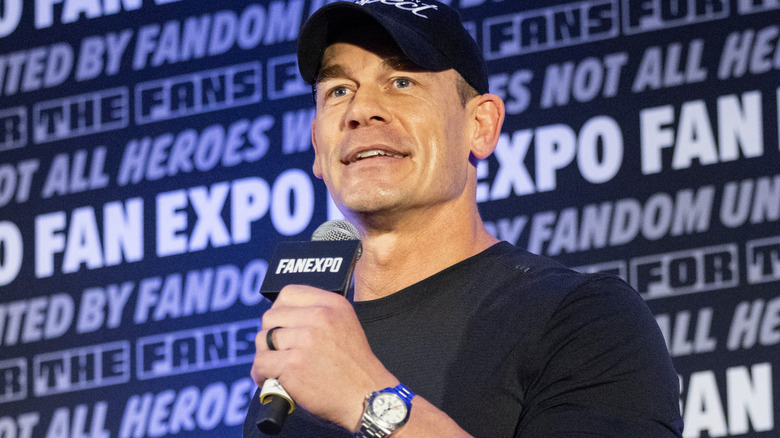 John Cena holding a microphone