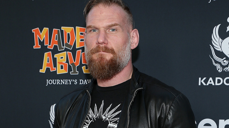 Josh Barnett wearing a leather jacket
