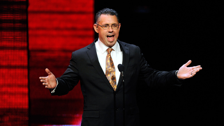 WWE commentator and host Michael Cole speaks at a news conference announcing the WWE Network at the 2014 International CES at the Encore Theater at Wynn Las Vegas on January 8, 2014 in Las Vegas, Nevada. The network will launch on February 24, 2014 as the first-ever 24/7 streaming network, offering both scheduled programs and video on demand. The USD 9.99 per month subscription will include access to all 12 live WWE pay-per-view events each year. CES, the world's largest annual consumer technology trade show, runs through January 10 and is expected to feature 3,200 exhibitors showing off their latest products and services to about 150,000 attendees.