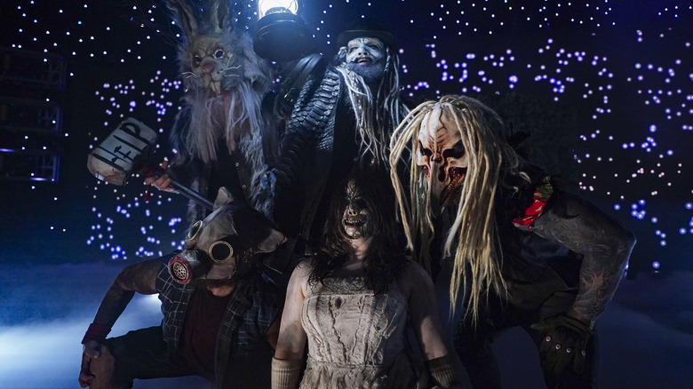 The Wyatt Sicks posing with light behind them