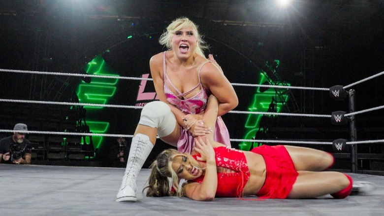 Zena Sterling puts an opponent in a submission in the middle of the ring during a match on "WWE LFG: Legends & Future Greats."